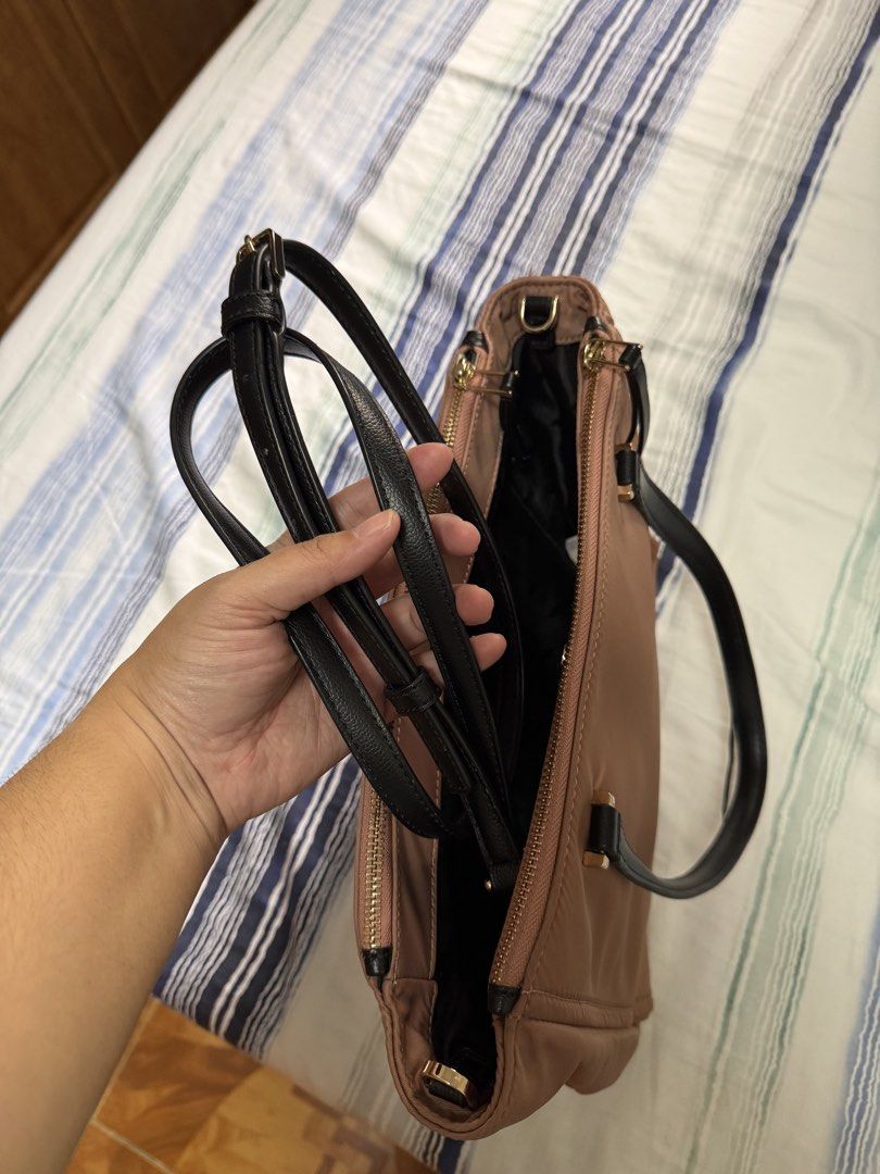 Kate Spade Tote Bag (Category: Tote Bags) located in Calamba. Submitted by sofiesmerch (Listing ID 1456027555, Image 3). Description: Good condition overall except for handle issues (see photo).