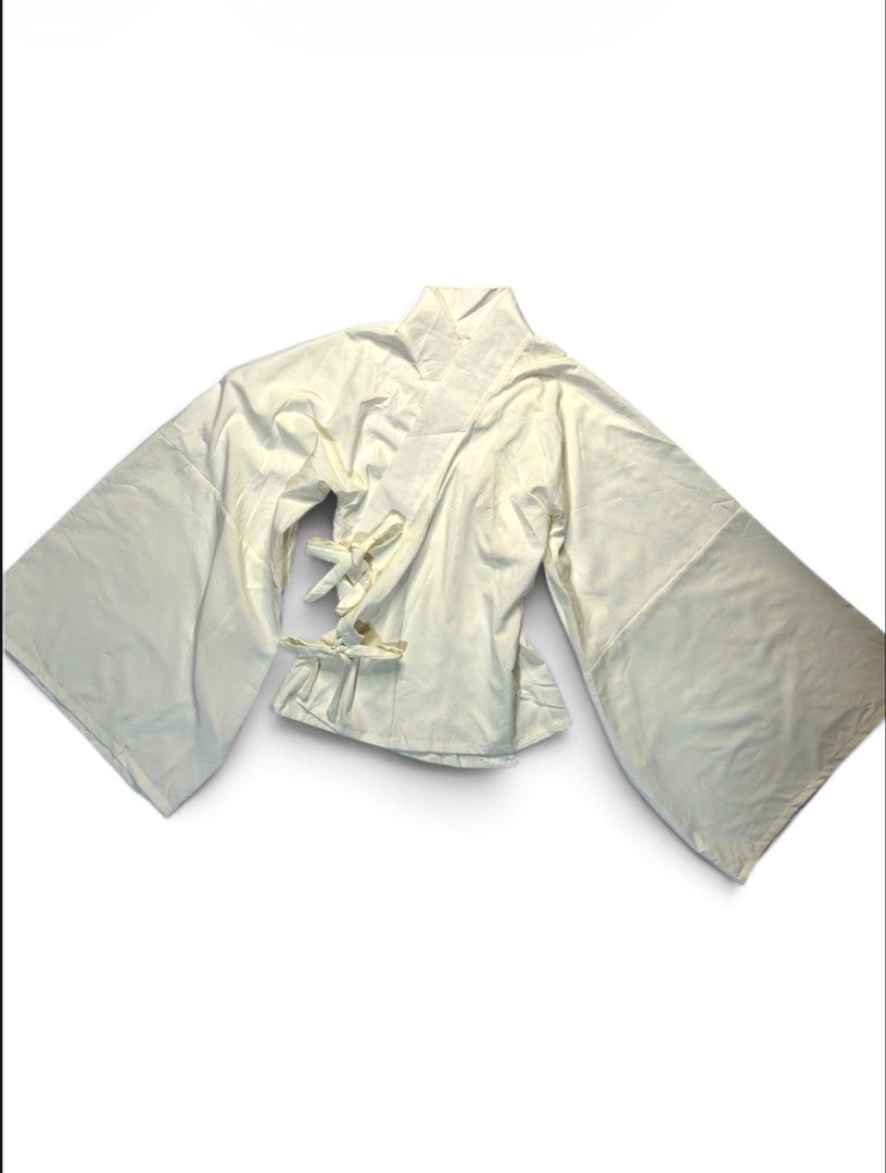 Kimono Like Bell Sleeves Tie Top (Category: Others Tops) located in Marikina City. Submitted by wearablearttt (Listing ID 1456032971, Image 2). Description: MEASUREMENTSw (inch, laid flat) length 22 width free .