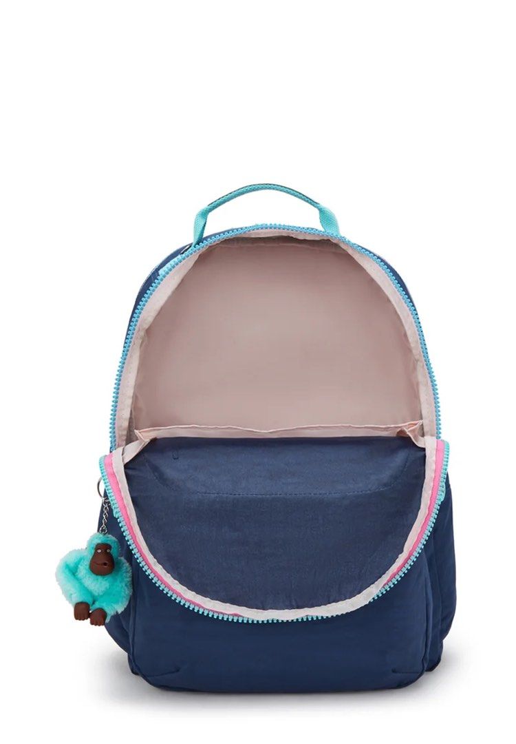 Kipling Navy Blue Backpack with Pink and Teal Accents (Category: Backpacks) located in Makati City. Submitted by chewyy.j (Listing ID 1456008552, Image 2). Description: - Navy blue Kipling backpack - Accented with pink and teal trim - Comes with the iconic fluffy monkey keychain - Spacious main compartment with wide opening - Convenient front zip pocket for essentials - Ideal for school, work, or everyday adventures - Clean and well-maintained in
