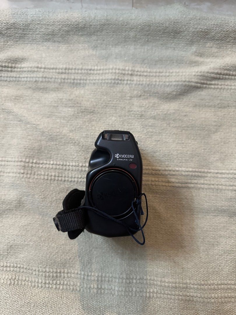 Kyocera Samurai Z2 Half Frame Film Camera (Category: Cameras) located in Manila. Submitted by rakusa95 (Listing ID 1455953478, Image 2). Description: Kyocera Samurai Z2 Half Frame Film Camera - 35mm - very good working condition - working flash - working zoom - working date back - half frame camera where a camera exposes only half of a standard 35mm film frame at a time. This turns a standard 36-exposure roll into 72 shots - 36 exp roll = 72 shot