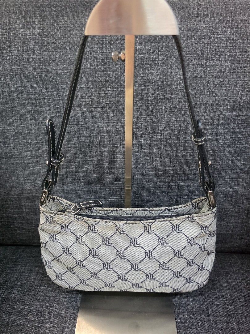 Lauren Ralph Lauren Monogram Shoulder Bag (Category: Luxury Bags & Wallets) located in General Trias. Submitted by roselle2230 (Listing ID 1456000353, Image 1). Description: - Classic Lauren Ralph Lauren shoulder bag - Signature RL monogram pattern - Black leather trim and strap - Zipper closure - Interior tag - Ideal for everyday use.