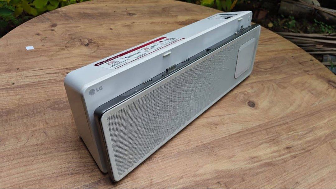 LG Speaker and IPOD IPAD dock (Category: Soundbars, Speakers & Amplifiers) located in Pasig City. Submitted by iambernabe (Listing ID 1455970801, Image 1). Description: - LG Portable Bluetooth Speaker - Wireless streaming via Bluetooth - Dual dock for Apple and Android devices - Built-in charging function - Compact and stylish design - Excellent sound quality for its size - Fully functional and in great working condition.