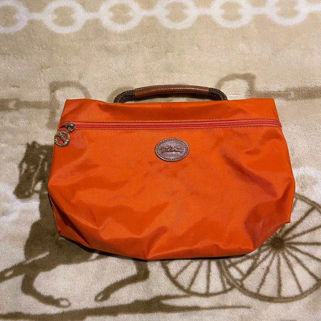 Longchamp Clutch Bag/Handbag (Category: Luxury Bags & Wallets) located in Manila. Submitted by bidgeyow20688 (Listing ID 1455993077, Image 1). Description: excellent condition no issue/needwash width 12 length 8.