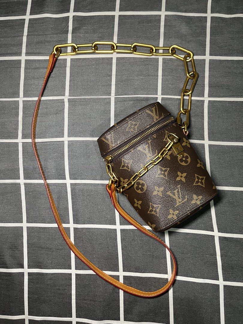 Louis Vuitton Monogram Cylinder Bag with Chain (Category: Luxury Bags & Wallets) located in Manila. Submitted by bommmieee00 (Listing ID 1455954223, Image 1). Description: - Louis Vuitton Monogram Canvas Cylinder Bag - Features a gold-tone chain - Includes a detachable leather strap - Secure zipper closure - Adorned with a gold-tone lock detail - Ideal for carrying your daily essentials.