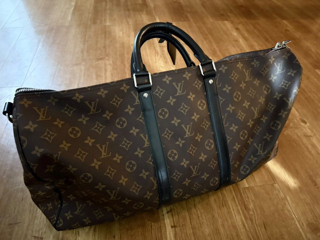 Louis Vuitton Monogram Keepall 55 Duffle Bag (Category: Luxury Bags & Wallets) located in Quezon City. Submitted by adnct (Listing ID 1455994332, Image 2). Description: - Authentic Louis Vuitton Keepall 55 - Classic monogram canvas - Black leather trim and handles - Silver hardware - Includes detachable shoulder strap & bag tag - Ideal for travel or weekend getaways - Spacious interior - Zippers function smoothly What you see is what you get. I d