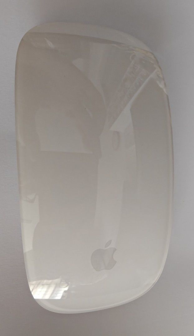 Magic Mouse (Category: Mouse & Mousepads) located in Singapore. Submitted by louis_12 (Listing ID 1455907175, Image 2). Description: - Apple Magic Mouse - Color: Silver - Lightning connector No box and cable. In extreme good condition, used to trackpad..