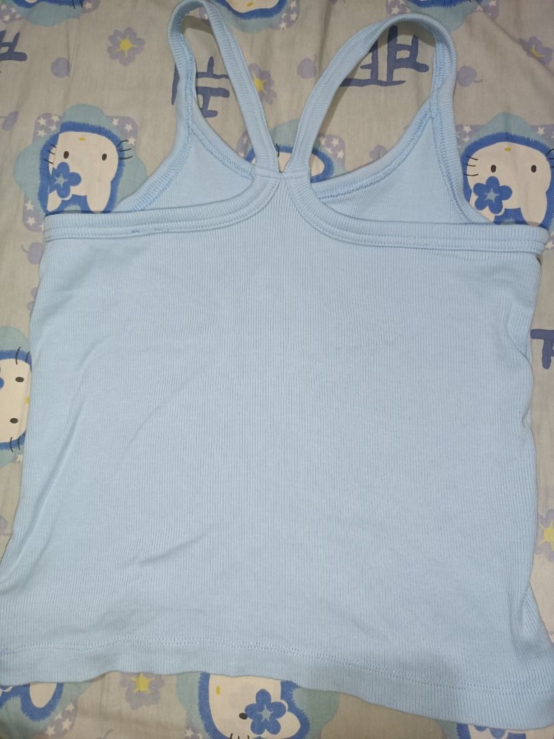 Mango Baby Blue Ribbed Tank Top (Category: Sleeveless) located in Manila. Submitted by noteileen110759 (Listing ID 1455997041, Image 2). Description: Size small-med Has a bleach stain Location: Malate, Manila .