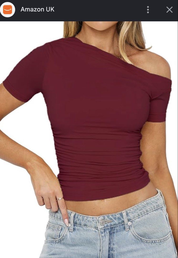 Maroon One Shoulder Short Sleeve Top (Category: Blouses) located in Las Pinas. Submitted by katb86 (Listing ID 1455923251, Image 2). Description: - Chic maroon one-shoulder top - Comfortable short sleeves - Stretchy fabric for a great fit - Versatile: perfect with jeans or skirts - Designed for a very flattering silhouette.