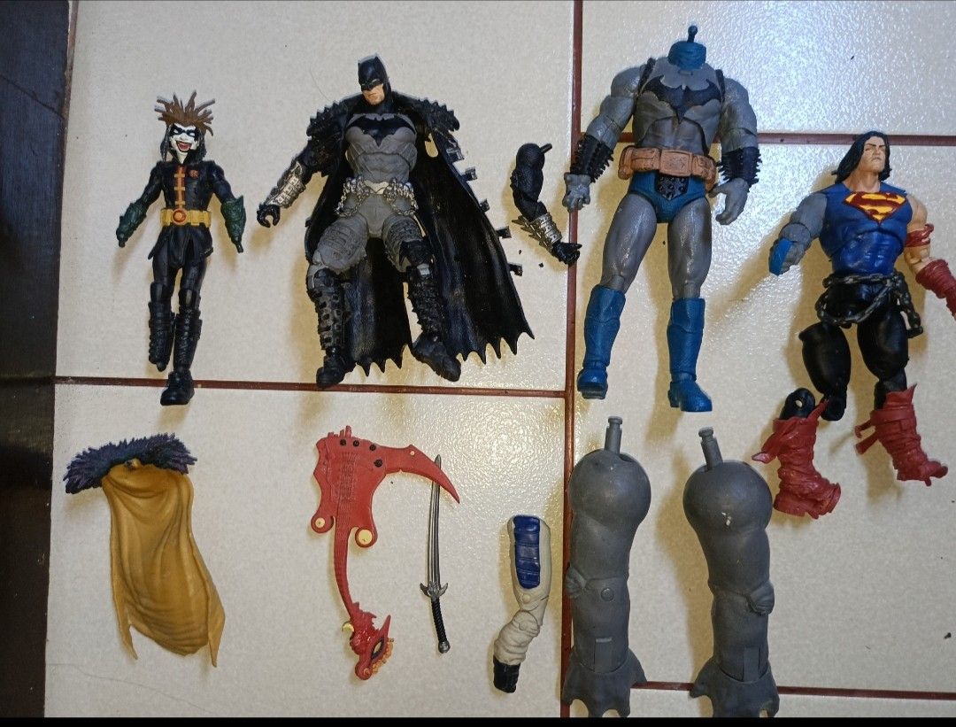 McFarlane loose DC Comics Batman & Superman Action Figures Lot (Category: Figurines & Statues) located in Pasay City. Submitted by rogertrinidad1992 (Listing ID 1455976312, Image 1). Description: -loose as is may damage yung iba call or txt 09185811730 loc pasay Lot of DC Comics action figures including Batman, Robin, and Superman. - Please note: Some figures are incomplete, missing heads or limbs. - Accessories included: cape, axe, and sword. - 