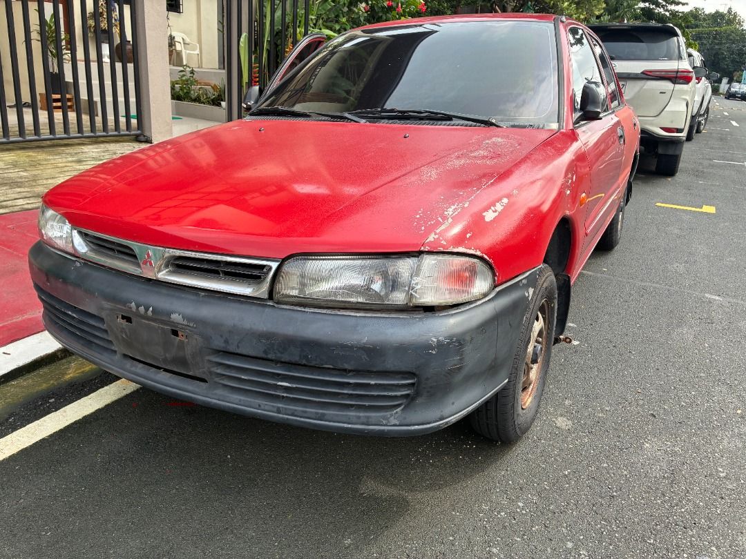 Mitsubishi Lancer EL Manual (Category: Used Cars) located in Quezon City. Submitted by jiggyboy11 (Listing ID 1450740931, Image 1). Description: Selling unit as-is For scrap Not eligible for transfer of ownership (owner deceased) No papers Not in running condition Needs engine overhaul due to broken timing belt Broken compressor Broken rear shock absorber Manual transmission Carburetor type Location: Near OLPH Parish, Project 8, Quezon City.