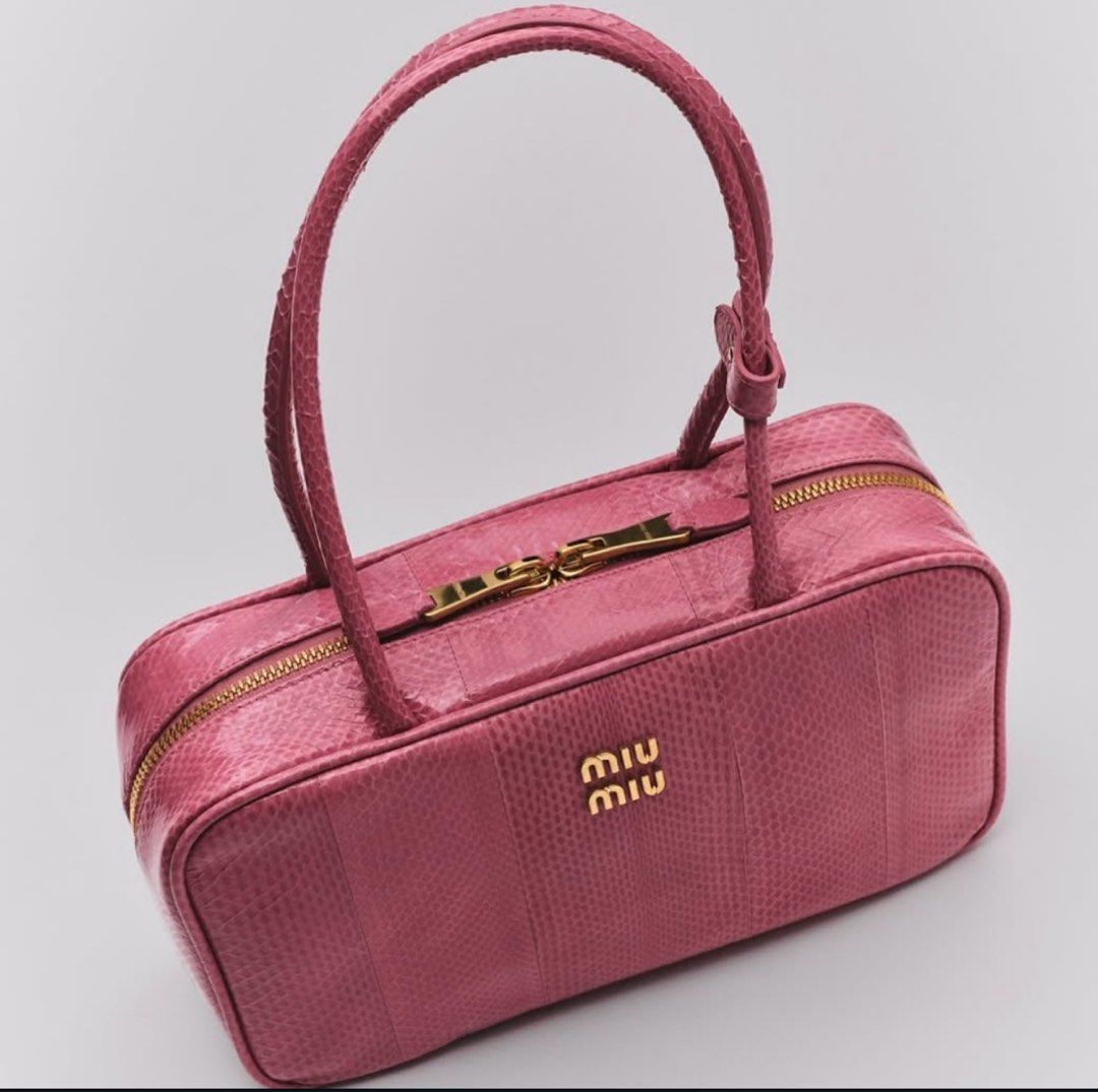 Miu Miu Beau (Category: Luxury Bags & Wallets) located in Quezon City. Submitted by kingwolf824 (Listing ID 1455910852, Image 1). Description: MIU MIU Ayers Medium Beau Top Handle Bag in Petal Pink. This is a super rare find! This looks so good in person! The dual top zippers open to a soft pink leather interior with zipper pockets on both sides. Comes with box and dustbag. No returns, No exchange, No refunds..
