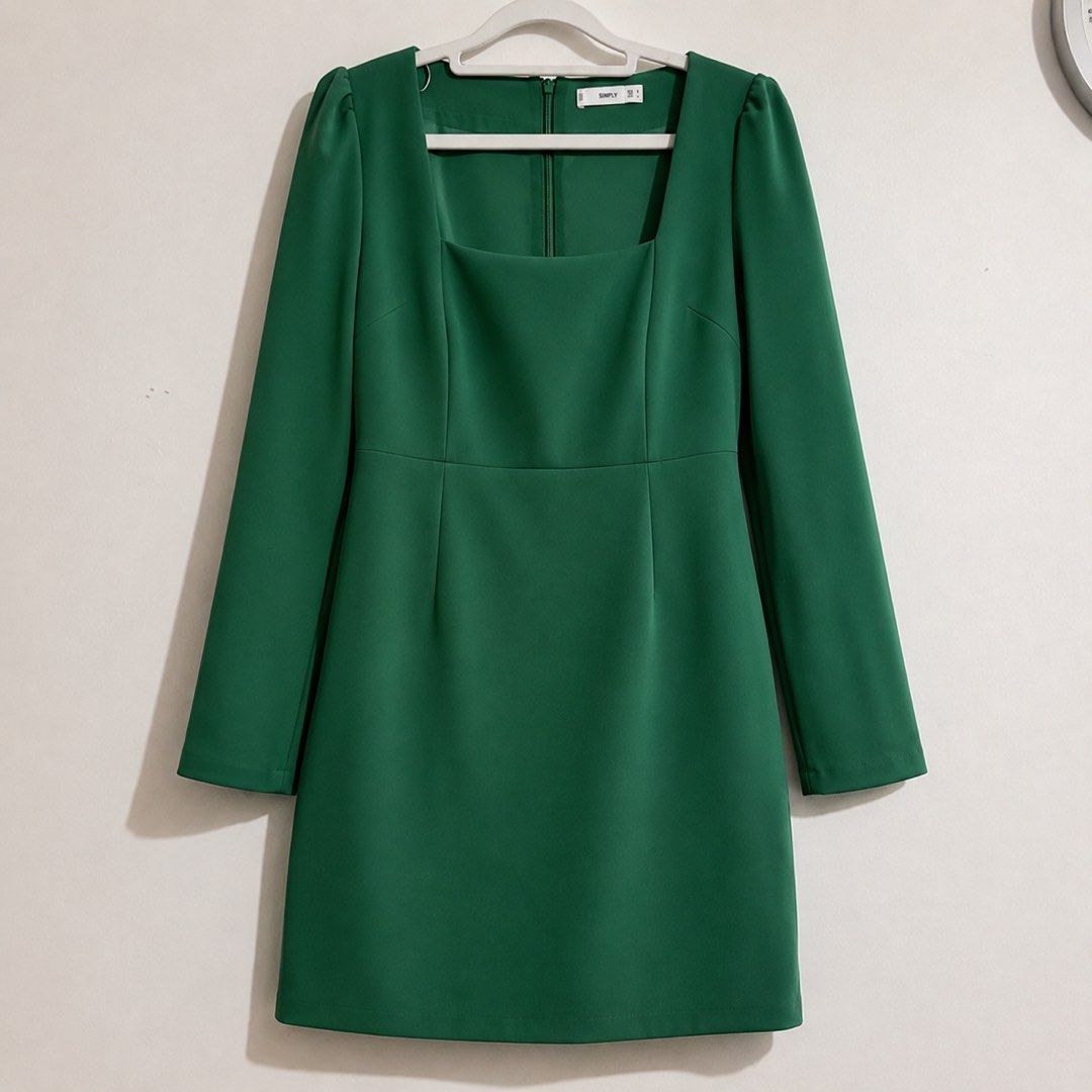 MNG Green Mini Dress (Category: Dresses) located in Manila. Submitted by theopal (Listing ID 1455884572, Image 2). Description: * size Small but can fit to med size *Elegant emerald green mini dress * Square neckline with wide shoulder straps * Long sleeves with subtle gathered/puffed shoulders * Structured, fitted bodice with vertical panel seams * Defined waist with a clean horizontal seam * Slightly A-line skirt for a flattering silhouette * B