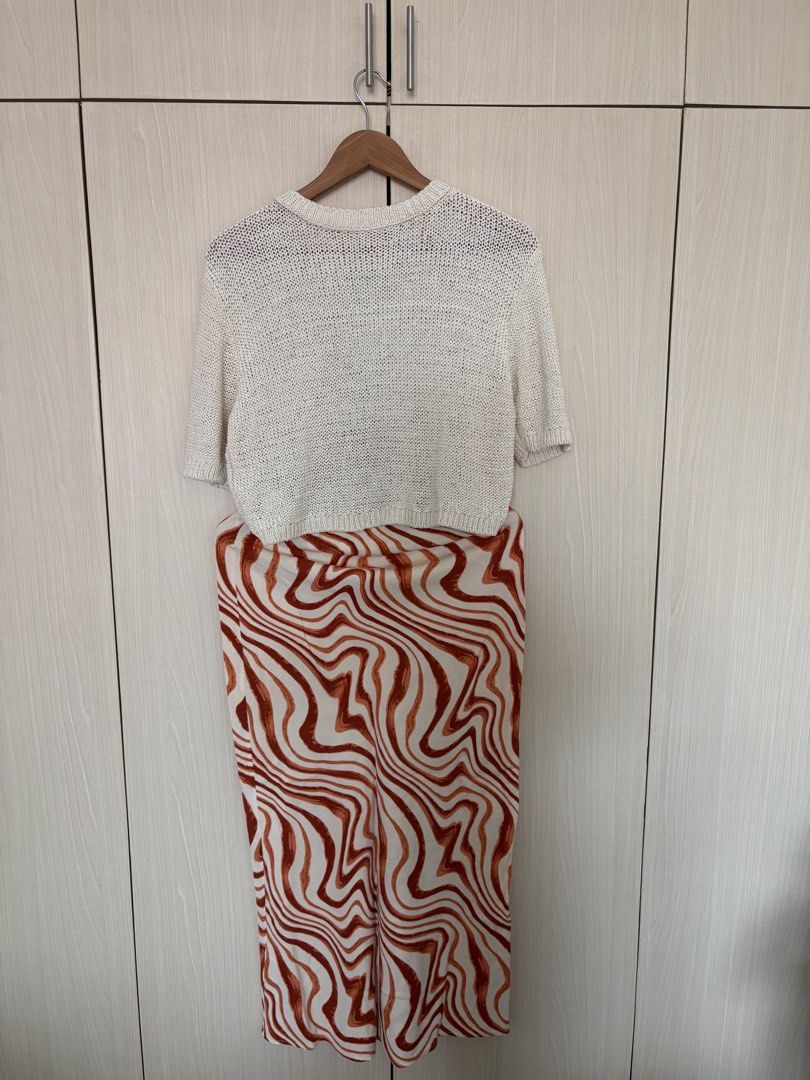 MNG Zebra Print Midi Skirt Size S (Category: Skirts) located in Paranaque City. Submitted by chicrepeats (Listing ID 1455888323, Image 3). Description: - MNG midi skirt - Cool brown and white wavy print - Estimated size S - Comfortable elasticated waistband - Perfect for dressing up or down - Easy to pair with a simple top.