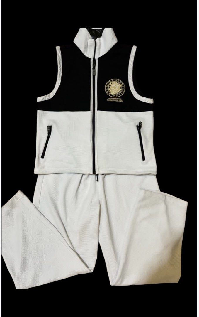 Mode Senba The Devil Black White Tracksuit Vest & Pants Set (Category: Sets & Coordinates) located in Quezon City. Submitted by letsdeclutter101 (Listing ID 1455904709, Image 3). Description: - Black and white tracksuit set - best fits 5'7 n above - Waffle knit material - Zip-up vest with devil graphic on back - Graphic details: 'Mode Senba The Devil', 'It's Really A Real Thing' - Pants with drawstring waist and back pockets - Ideal for streetwea