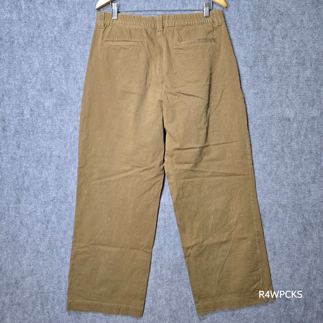 MUJI DARK BEIGE WIDE PLEATED PANTS (Category: Other Bottoms) located in San Mateo. Submitted by r4wpcks (Listing ID 1456015626, Image 2). Description: Size on Tag: XXL Best Fit: 34 inches Waist: 34 inches Length: 40 inches Leg Hole / Hem: 10.5 inches Condition: 9/10 Color Rate: 9/10 Issue: None COLOR MAY VARY DUE TO LIGHTING Location: San Mateo Rizal, near Marikina J&T/Lalamove courier, shipping fee should be handled by the buyer ❗Message R4WPCKs