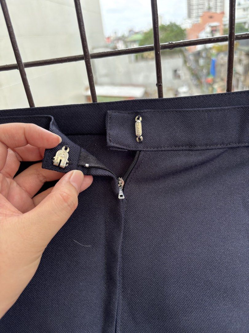 Navy Blue Mini Skirt with Button and Zip Closure (Category: Skirts) located in Manila. Submitted by decluttergivebing (Listing ID 1455907114, Image 3). Description: - Classic navy blue mini skirt - Front button and zip closure - Versatile for casual or work outfits - Effortless to pair with various tops.