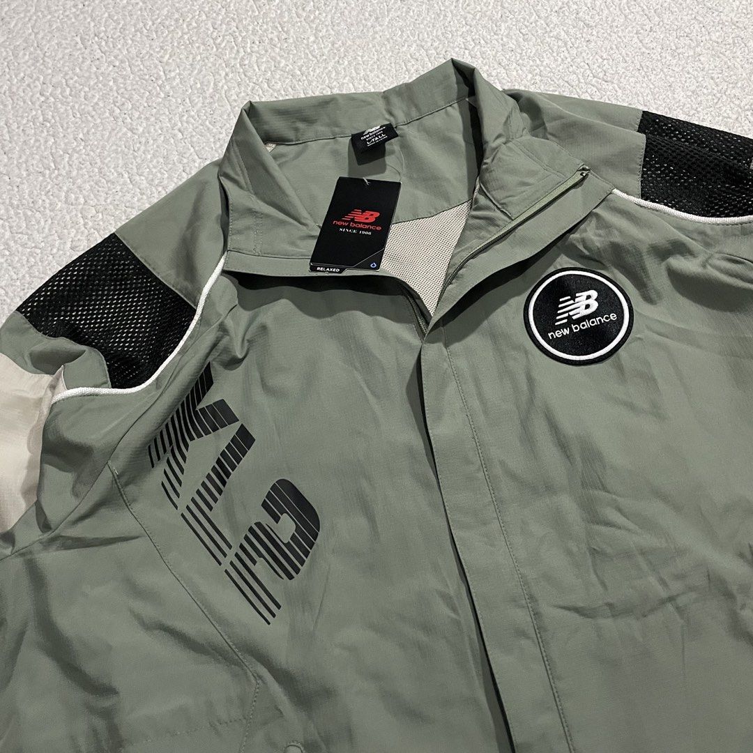 New Balance KL2 Windbreaker (Category: Coats, Jackets and Outerwear) located in Cavite. Submitted by holeeb (Listing ID 1456004146, Image 3). Description: N/ew B/alance KL2 Nature of the Game Large on tag Dimes: 25.5x32.5 Color rate: 10/10 Condition: 10/10 as new condition🔥 -with hangtags -water resistant -adjustable hem for snug fit + sf (shipping fee depends on size of pouch and location) Issue: none (swipe for more pictures) vary due to light