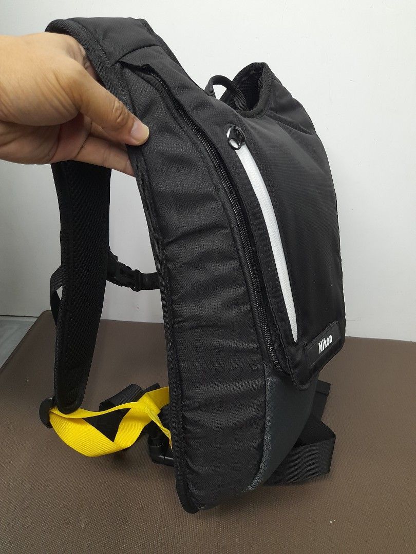 Nikon runner backpack (Category: Camera Bags & Carriers) located in Muntinlupa City. Submitted by mlbphworks (Listing ID 1455875690, Image 2). Description: 👉️Nikon runner backpack Weather resistant,Lightweight and durableGood as Brandnew💯 Main compartment holds up to 6 litres Adjustable chest whistle / hip strap Slim dimensions: 370 × 75 × 225 mm Weighs just 450 grms when empty Ideal for Multi #sport #activities,#skiing, #hiking, or #cycling #d