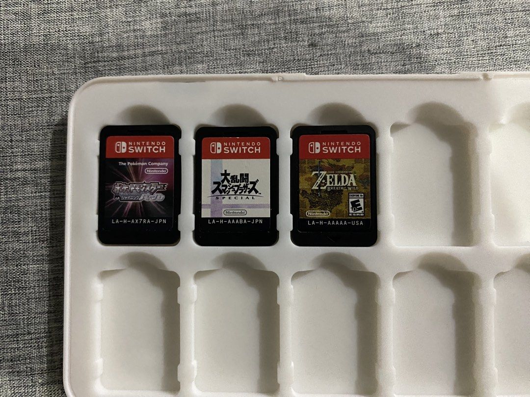 Nintendo Switch Games (Category: Nintendo) located in Lipa City. Submitted by enriquedslva (Listing ID 1455970072, Image 2). Description: Nintendo Switch Games: Mario Kart - 1700 (SOLD) Mario Party Jamboree - 1800 (SOLD) ANCNH - 1200 Pokemon Shining pearl (JPN) - 1500 (SOLD) Smash Bros (JPN) - 1400 Zelda TOK (JPN) - 1600 Zelda BOTW (Cart) - 1500 Take all - 5.5k.