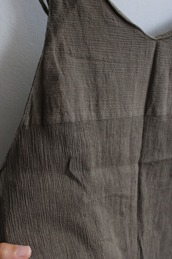 Olive Green Spaghetti Strap Asymmetrical Hem Dress (Category: Dresses) located in Aurora. Submitted by mothere (Listing ID 1455876134, Image 3). Description: - Olive green dress - V-neckline with spaghetti straps - Flowy asymmetrical hemline - Textured fabric - Simple and chic design 👌🏽 what you see in the photos is what you will get 🌸 discounts available if you buy other items 🍸 all flaws or issues will be mentioned 🐚 no rush shipping 🍍 fe