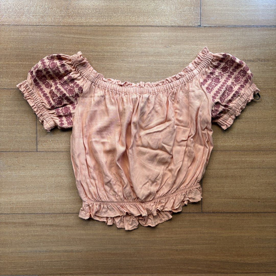 Forever21 Orange Boho Off-shoulder Blouse (Category: Blouses) located in Muntinlupa City. Submitted by stuki14 (Listing ID 1455914650, Image 2). Description: No when worn, can send the dimensions instead.