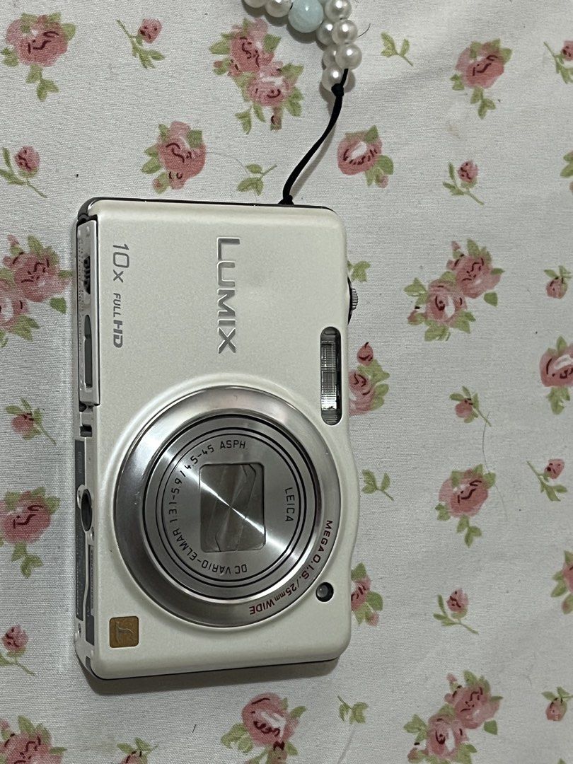 Panasonic Lumix DMC-SZ7 10x Optical Zoom Digital Camera (Category: Cameras) located in Taguig. Submitted by luckyforest-3ea7 (Listing ID 1455920225, Image 2). Description: - White Panasonic Lumix camera - 10x Full HD optical zoom - Leica DC Vario-Elmar lens - Records AVCHD video - Includes Verbatim USB drive - Great for both photos and videos - Selling as a bundle * Japanese language * Lens needs to be manually forced open and closed * Please see