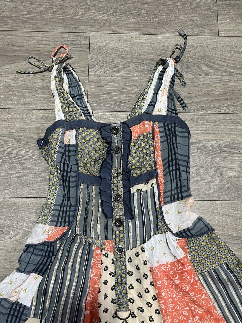 Patchwork Button-Up Sundress (Category: Dresses) located in Mandaluyong City. Submitted by namislounge (Listing ID 1455855618, Image 3). Description: The prettiest!! - Adorable patchwork sundress with a mix of patterns and colors. - Fits up to 28-29 waist (through tape measure) - Approx. 35 inches length - Straps have a tie for added flair. - Has yellow-ish part on the front (see 2nd photo) but looks part of the style ^^ - With side zipper - Ligh