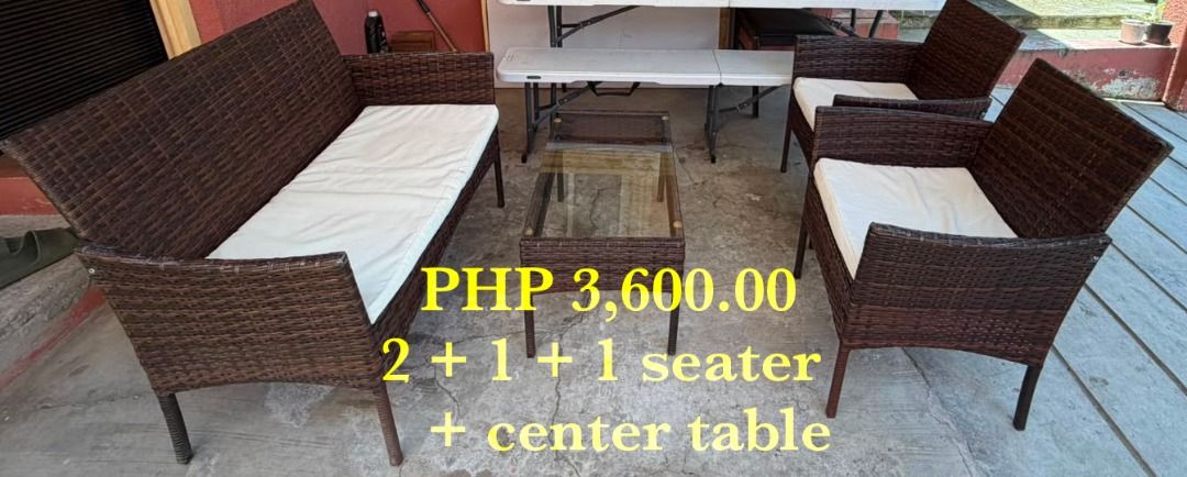 Patio Sofa Set with Center Table (Category: Sofas) located in Manila. Submitted by lauboyd121 (Listing ID 1451513810, Image 1). Description: - Complete living room set: 2-seater sofa, two 1-seater chairs, and center table. - Material: Durable brown wicker with comfortable white cushions. - Versatile: Suitable for both indoor and outdoor spaces. - Price: PHP 5,100.00 - Inquiries welcome via message!.