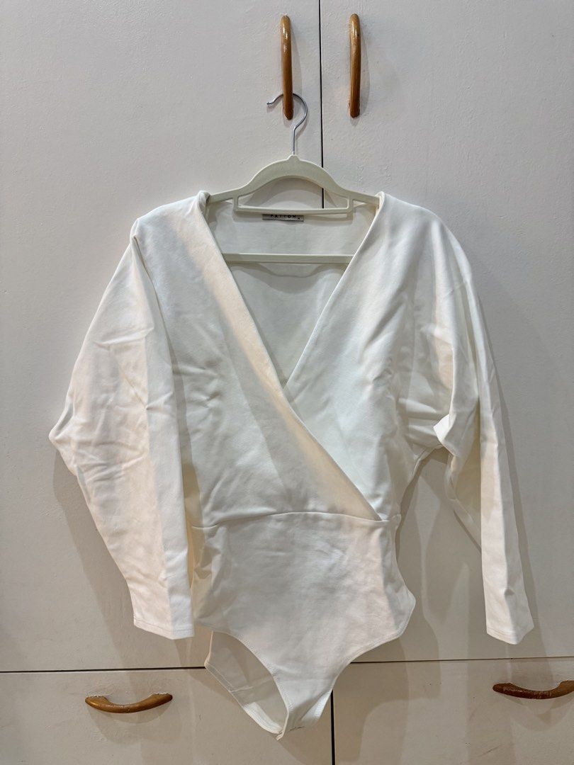 Patton Studio Cross Wrap Bodysuit (Category: Longsleeves) located in Tacloban City. Submitted by marjdom23__ (Listing ID 1452060263, Image 1). Description: • Used a once for my recognition, still in mint condition • RFS: Too big on me.