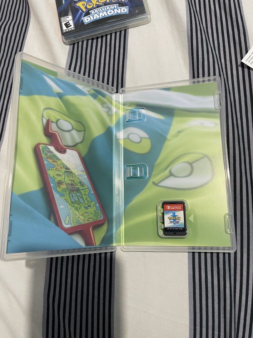 Pokemon Sword Nintendo Switch Game (Category: Nintendo) located in Quezon City. Submitted by shopmyclutter (Listing ID 1455925447, Image 2). Description: - Pokemon Sword for Nintendo Switch - Explore the vibrant Galar region - Battle trainers and become the champion - Includes game cartridge and original case - Perfect for solo adventures or co-op battles with friends - A must-have for any Pokemon enthusiast! Grab or Lalamove paid by buyer Item l