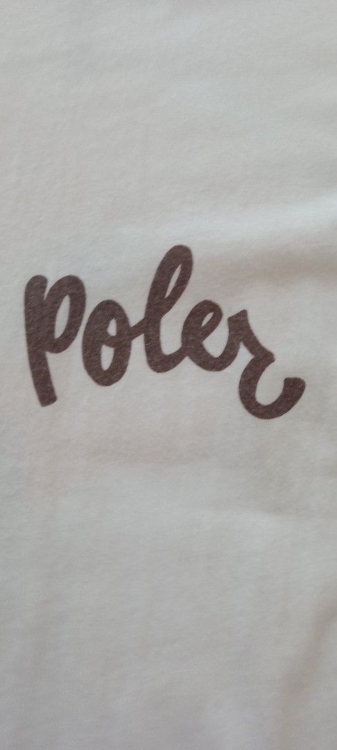 Poler Camp Vibes White T-Shirt X-Large (Category: Tshirts & Polo Shirts ) located in Koronadal. Submitted by gifts.thrifts (Listing ID 1455860094, Image 3). Description: - Brand: Poler - Color: White - Size: X-Large - Material: 100% Cotton - Design: Unique graphic on back with two yellow flowers (with eyes) and Poler logo on front chest - Style: Casual wear.