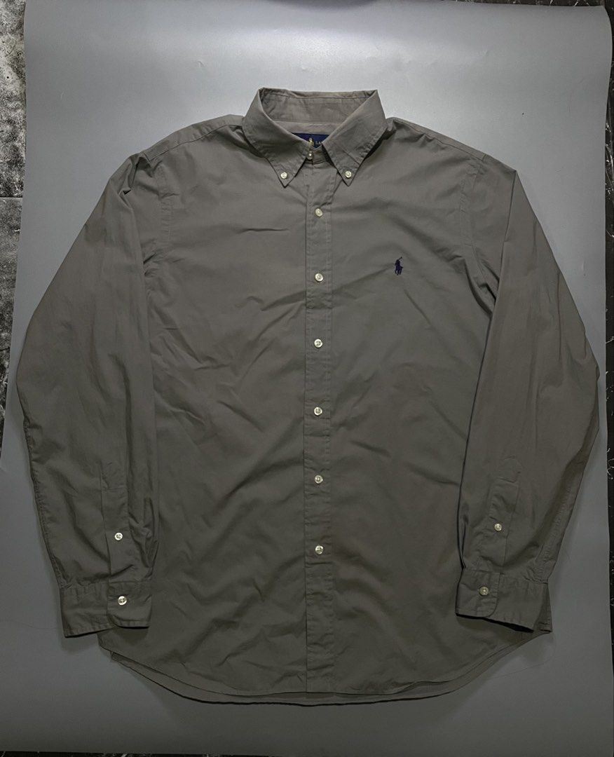 Polo Ralph Lauren long-sleeve button-down shirt (Category: Luxury Apparel) located in Bocaue. Submitted by mosthighcollective (Listing ID 1455991209, Image 1). Description: Polo Ralph Lauren long-sleeve button-down shirt Size: L on tag Dimes: 24 width 29 length Excellent condition No issue 2000 only Dm me to purchase 📥 .