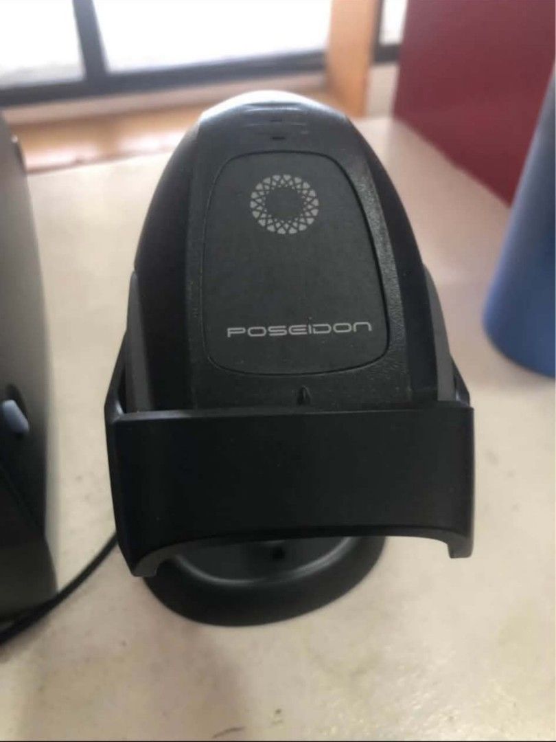 Poseidon Barcode Scanner with Stand (Category: Printers, Scanners & Copiers) located in Manila. Submitted by qjvcuento99069 (Listing ID 1455856388, Image 1). Description: - Poseidon barcode scanner - Includes original stand - Color: Black - Perfect for retail or inventory management - Fully functional and in great working condition - Reason for selling: No longer required - Feel free to ask any questions!.