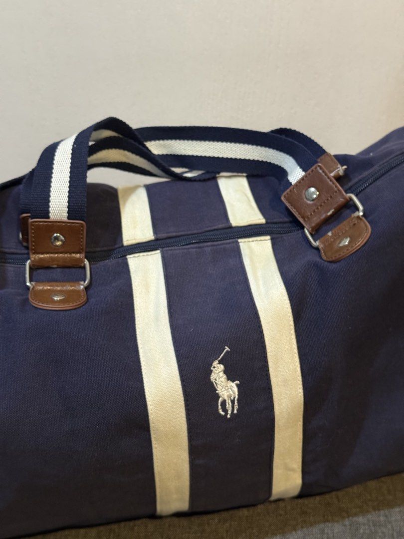 Ralph Lauren Weekender Bag or Duffle Bag (Category: Sling Bags) located in Makati City. Submitted by johnf02 (Listing ID 1456010619, Image 1). Description: • Price: Php 890 • Well used, please refer to photos • Buy 2 items from my listings, get a discount • Sold on an as is, where is basis • Payment via GCash/Maya/BPI/BDO/Unionbank/GoTyme • Shipping to be shouldered by the buyer .