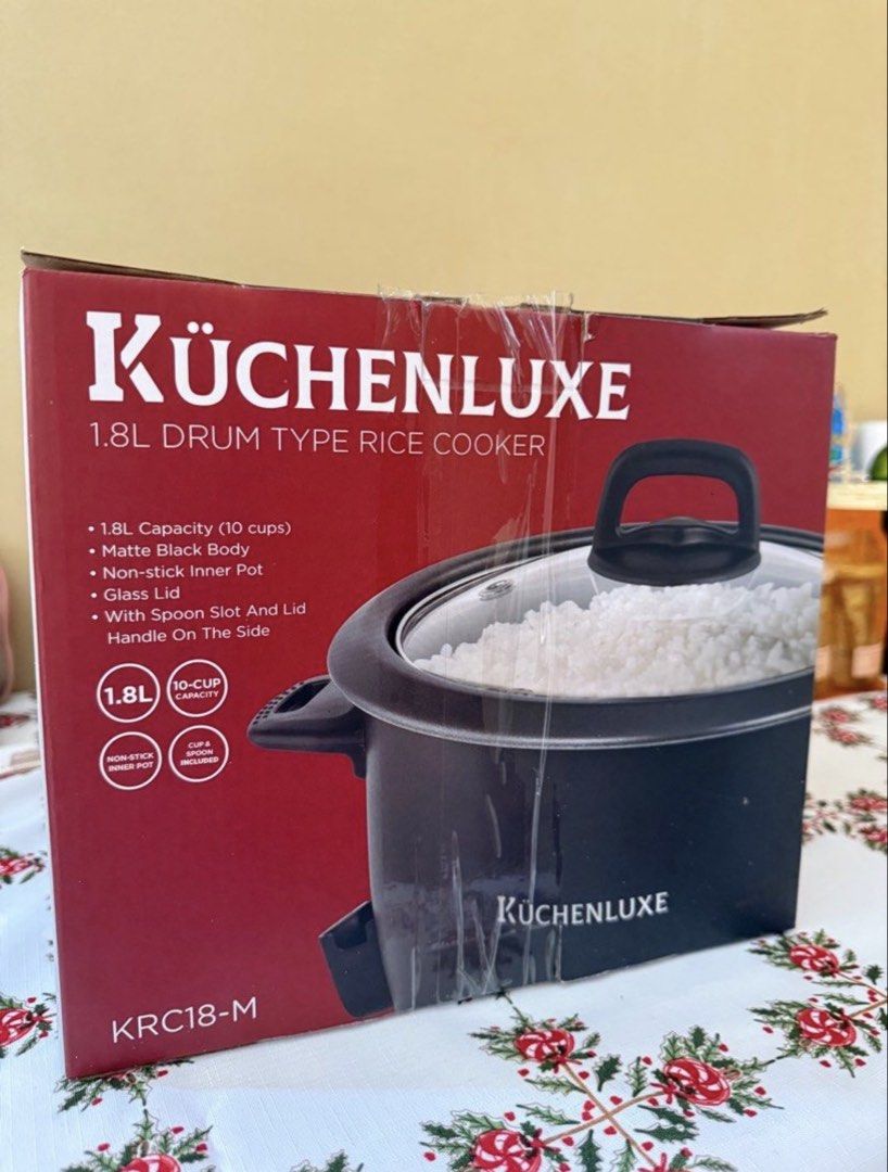 Rice Cooker 1.8L (Category: Cookware & Accessories) located in Manila. Submitted by pauiieegab (Listing ID 1455863302, Image 1). Description: 🍚 Brand new, unused 📦 Complete with box 1.8L (up to 10 cups) ✨ Matte black body 🍳 Non-stick inner pot 🪟 Glass lid 🥄 With spoon & cup included.