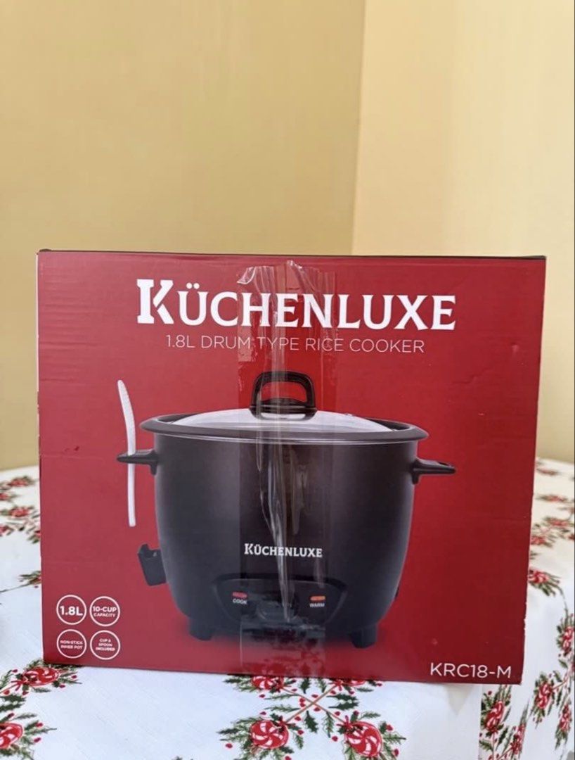 Rice Cooker 1.8L (Category: Cookware & Accessories) located in Manila. Submitted by pauiieegab (Listing ID 1455863302, Image 2). Description: 🍚 Brand new, unused 📦 Complete with box 1.8L (up to 10 cups) ✨ Matte black body 🍳 Non-stick inner pot 🪟 Glass lid 🥄 With spoon & cup included.
