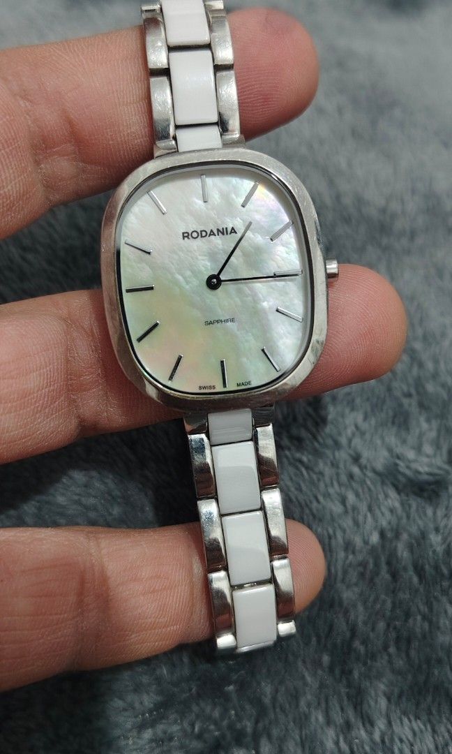 Rodania Sapphire (ladies watch) (Category: Women's Watches) located in Cebu City. Submitted by aceoftime (Listing ID 1456029248, Image 1). Description: In good working condition Swiss Made Mother of Pearl dial Sapphire crystal face Ceramic- stainless steel bracelet Swiss analog quartz movt Watch only Our Guarantee: 💯 Authentic All watches are checked by our experienced tech to ensure good functionality Please manage your expectations since these