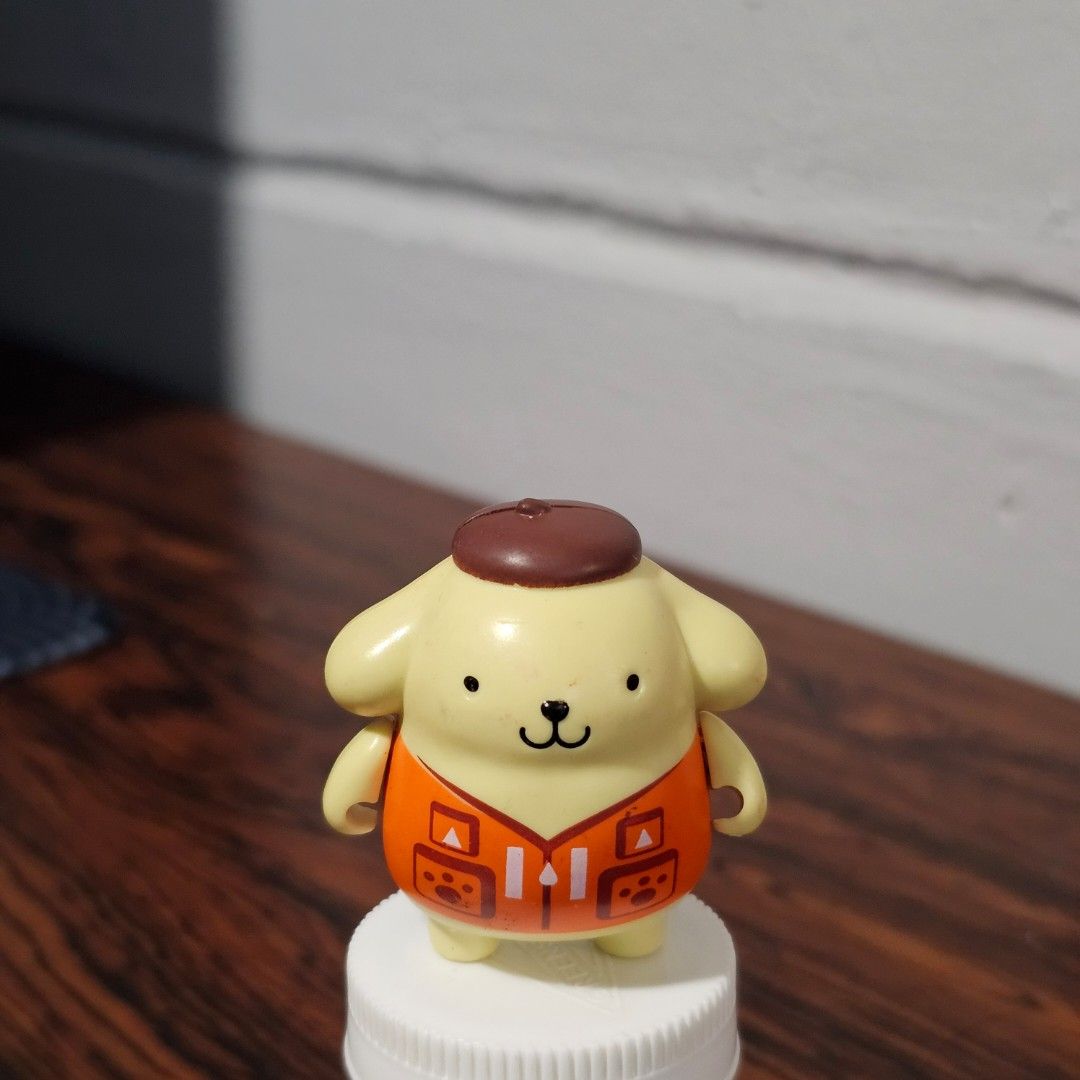 Sanrio Pompompurin Figure Toy (Category: Designer & Blind Box Toys) located in Rizal. Submitted by viviperera (Listing ID 1456025413, Image 1). Description: - Adorable Pompompurin figure by Sanrio. - Features the beloved yellow dog character in a cute orange vest. - Ideal for collectors and fans of Sanrio. - Compact size, perfect for display..