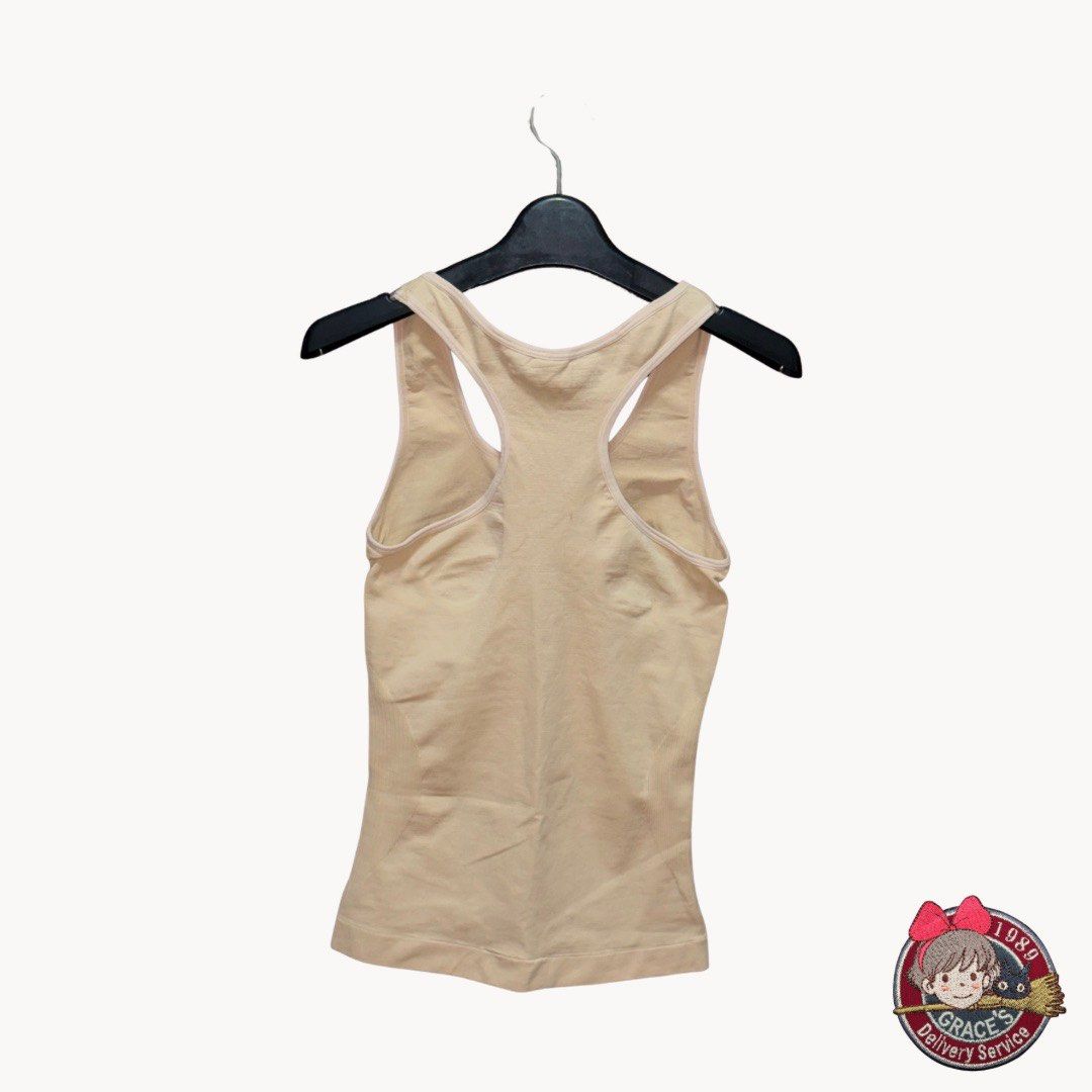 Seamless Racerback Tank Top - Beige (Category: Sleeveless) located in Manila. Submitted by thrsbjrs (Listing ID 1456051794, Image 2). Description: - Seamless comfort tank top - Racerback design - Soft and stretchy material - Fitted.