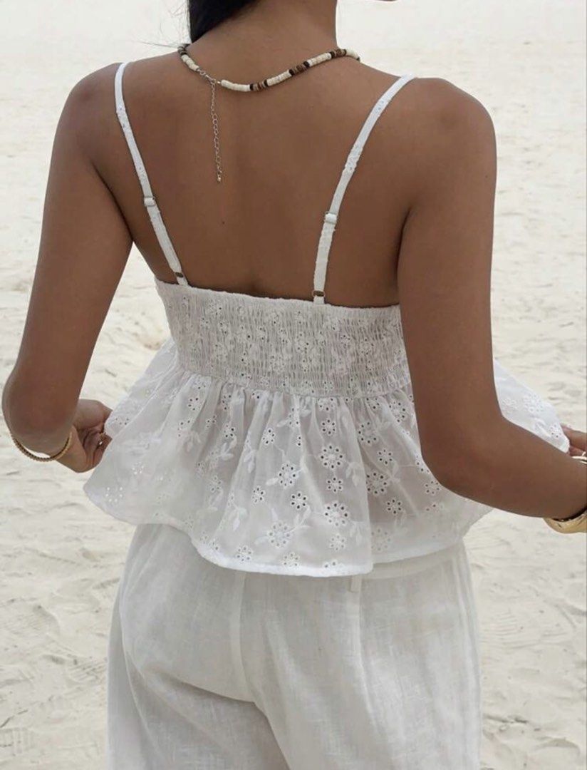 Shein White Eyelet Camisole Top with Tie Front (Category: Sleeveless) located in Antipolo. Submitted by pinkktopaz (Listing ID 1456034588, Image 3). Description: Size small fits xs-s Garterized back Used a couple of times only.