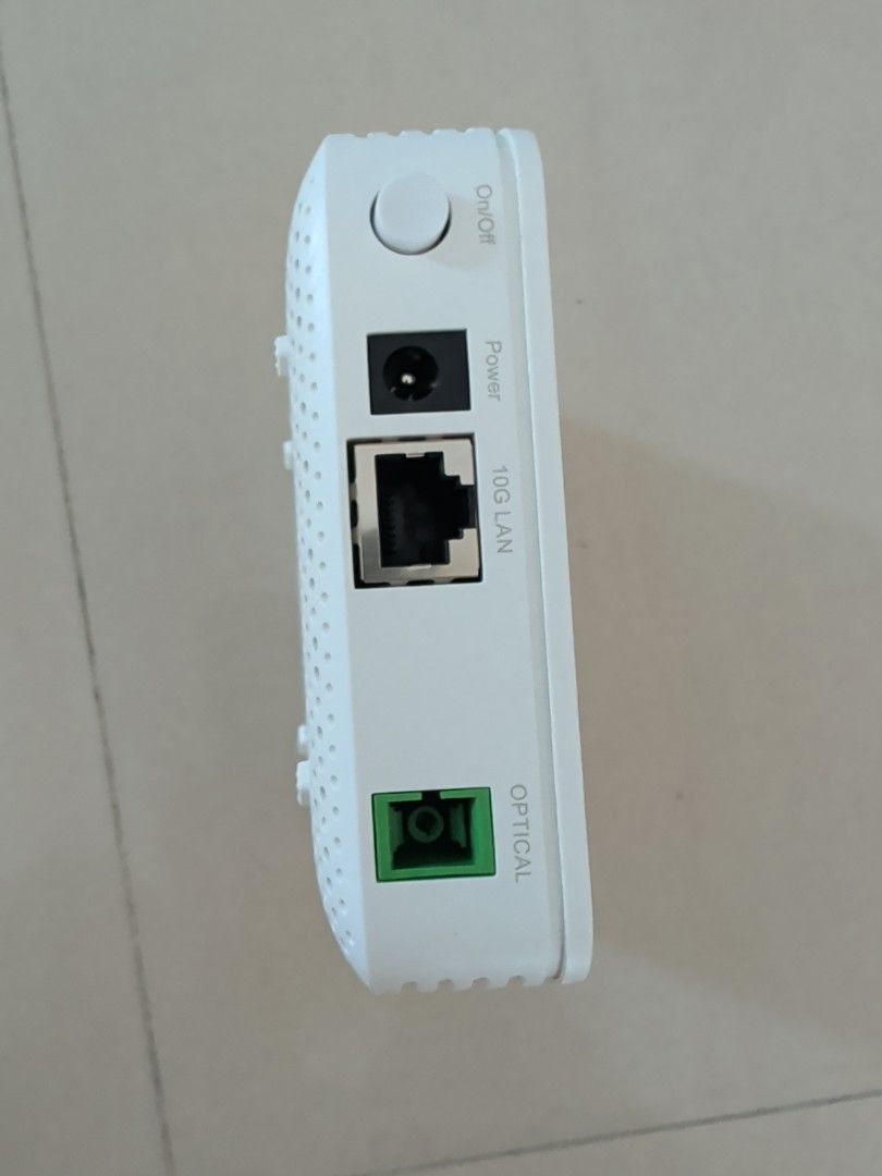 SIMBA Modem (Category: Networking) located in Singapore. Submitted by chipmunk2015 (Listing ID 1455930979, Image 3). Description: - SIMBA Branded Model - 10G LAN Port - Optical Port - Includes Power Adapter - Tested and Working Well.
