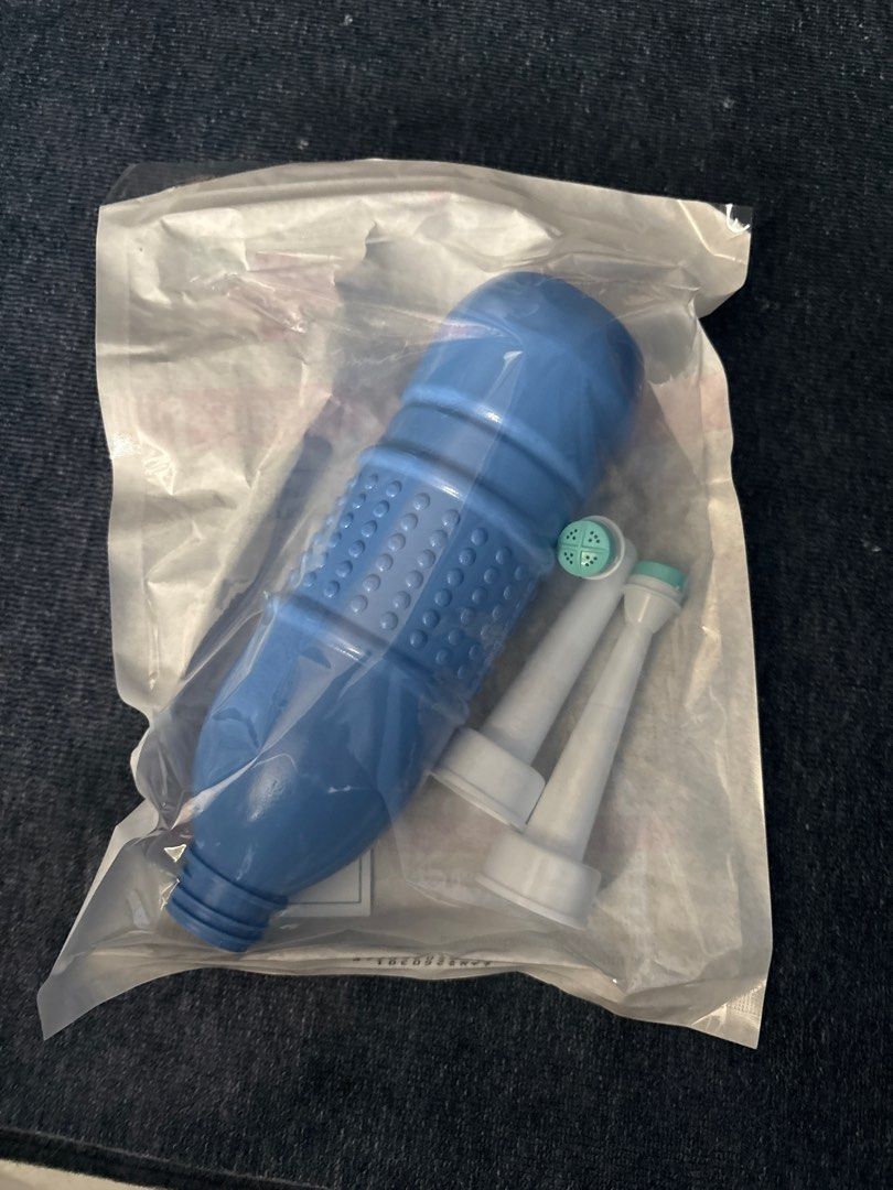Simple Portable Bidet (Category: Sanitary Hygiene) located in Singapore. Submitted by lightrei (Listing ID 1455909708, Image 3). Description: Simple Portable Bidet (Actual product shown in last 2 pictures) Vol: 500ml Colour: Blue only Stock:45 pcs (as of 16/8/2026) Buy in bulk for discount. .