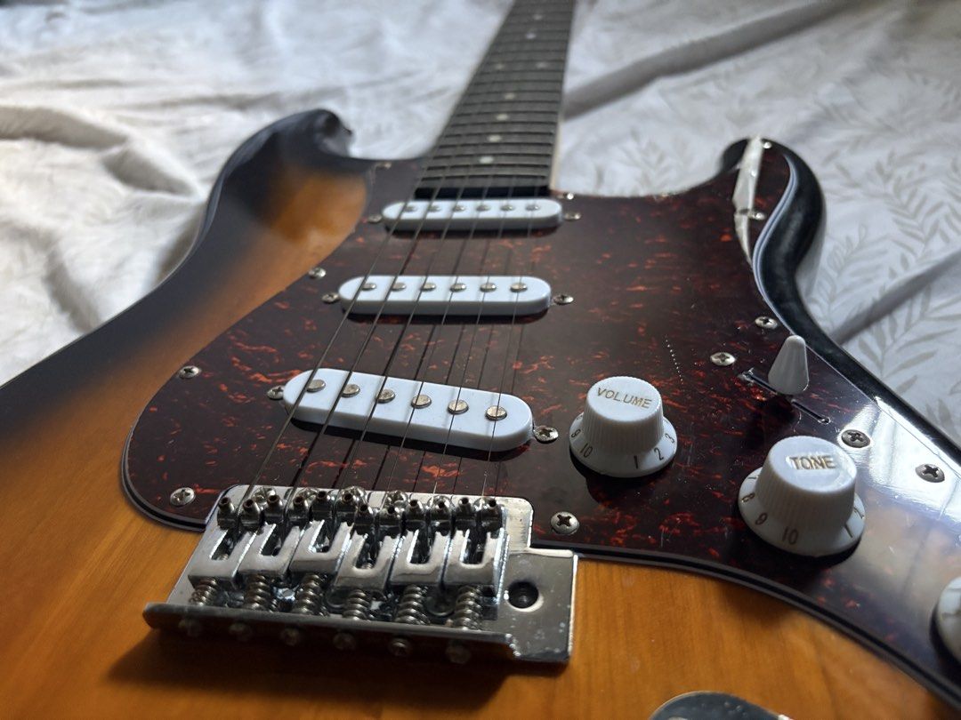 Skycaster Electric Guitar Sunburst (Category: Musical Instruments) located in Quezon City. Submitted by _rronnie (Listing ID 1455928611, Image 2). Description: RJ Guitar Skycaster Electric Guitar Stratocaster 2 tone Sunburst Tortoise Techwood with gig bag, cable, strap, tremolo arm barely played, no issues at all!.