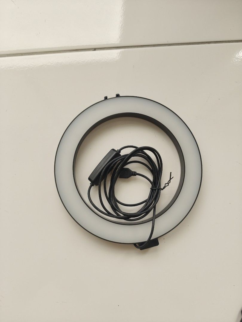 Small ring light (Category: Lighting & Studio Equipment) located in Singapore. Submitted by munsterusa (Listing ID 1455893567, Image 1). Description: Small USB powered ring light with step dimmer and 3 colour tone..
