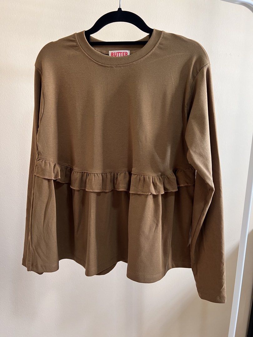 Soft Basic Ruffles Blouse (Category: Tops) located in Singapore. Submitted by yourstrulyanis (Listing ID 1456009866, Image 4). Description: Brand new instocks Available in 6 colours Length: 60cm | PTP: 47-70cm | Drop Shoulder | Sleeve: 60cm Buy 1 for $23 Buy 2 for $40.