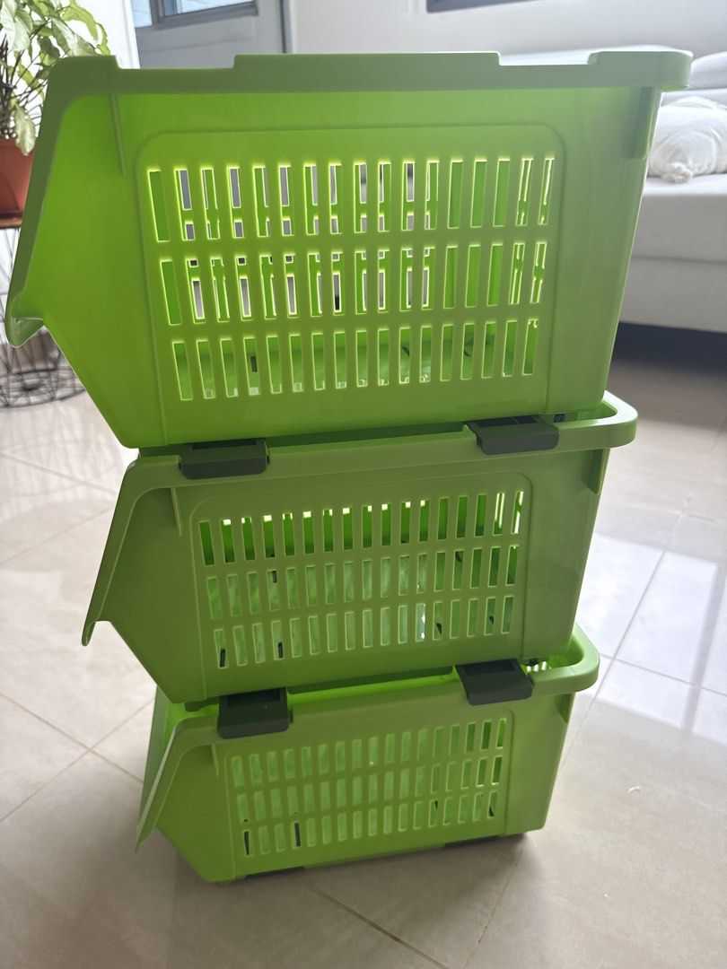 Stackable Storage Baskets - Green (Category: Storage Boxes & Baskets) located in Singapore. Submitted by abby22 (Listing ID 1455940580, Image 2). Description: - Set of 3 green stackable storage baskets - Perfect for organizing fruits, vegetables, or household items - Open design ensures good ventilation - Stackable to save space - Easy to clean.