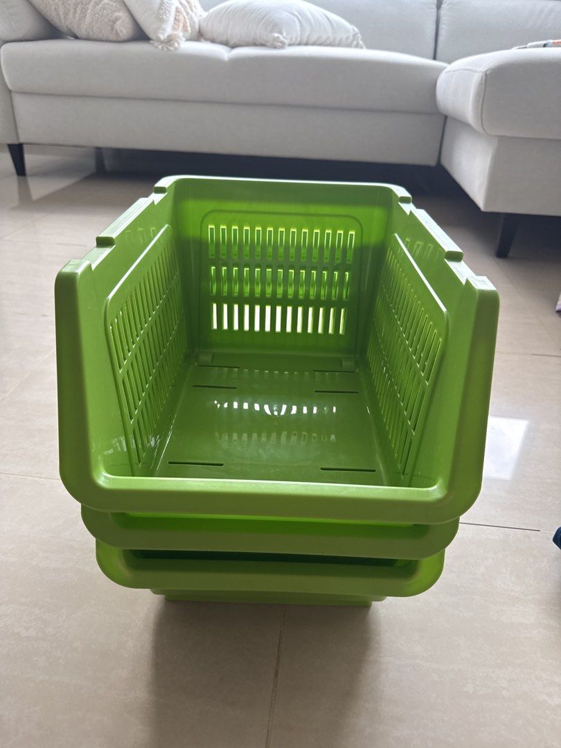 Stackable Storage Baskets - Green (Category: Storage Boxes & Baskets) located in Singapore. Submitted by abby22 (Listing ID 1455940580, Image 3). Description: - Set of 3 green stackable storage baskets - Perfect for organizing fruits, vegetables, or household items - Open design ensures good ventilation - Stackable to save space - Easy to clean.