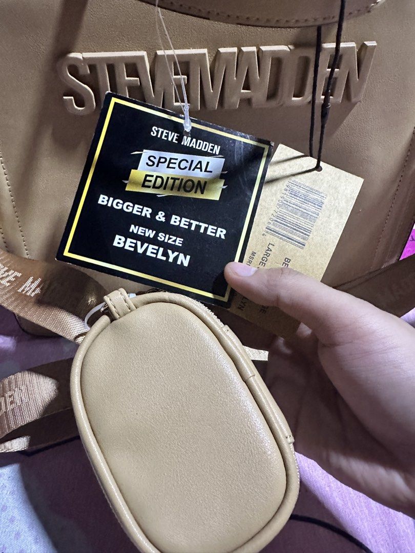 Steve Madden Bevelyn Special Edition Handbag (Category: Luxury Bags & Wallets) located in Manila. Submitted by edgiedge (Listing ID 1456022572, Image 3). Description: - Brand new Steve Madden Bevelyn Handbag - Special Edition: Bigger & Better New Size - Detachable strap included - Comes with a small coin pouch - Elegant gold hardware details - Embossed Steve Madden logo on the front - Tags are still attached 📍Tondo.