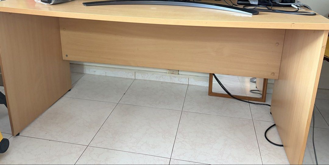 Study table (Category: Tables & Sets) located in Singapore. Submitted by happydays_bear (Listing ID 1455867302, Image 1). Description: A light wood-finish computer desk. Desk Surface: Light beech or maple colored laminate top with an ergonomic curved front cutout. About 150 cm x 74 cm x 76 cm.