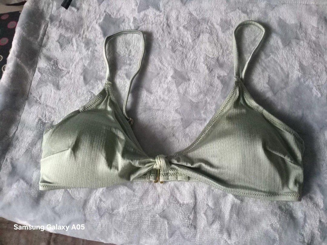 Swimwear top for TAKE ALL (Category: Bikinis & Swimsuits) located in Taguig. Submitted by newwavecollection (Listing ID 1455945662, Image 2). Description: yung green hndi nagamit yung colorful seldom used green and flower print are H&M Brand medium to large.